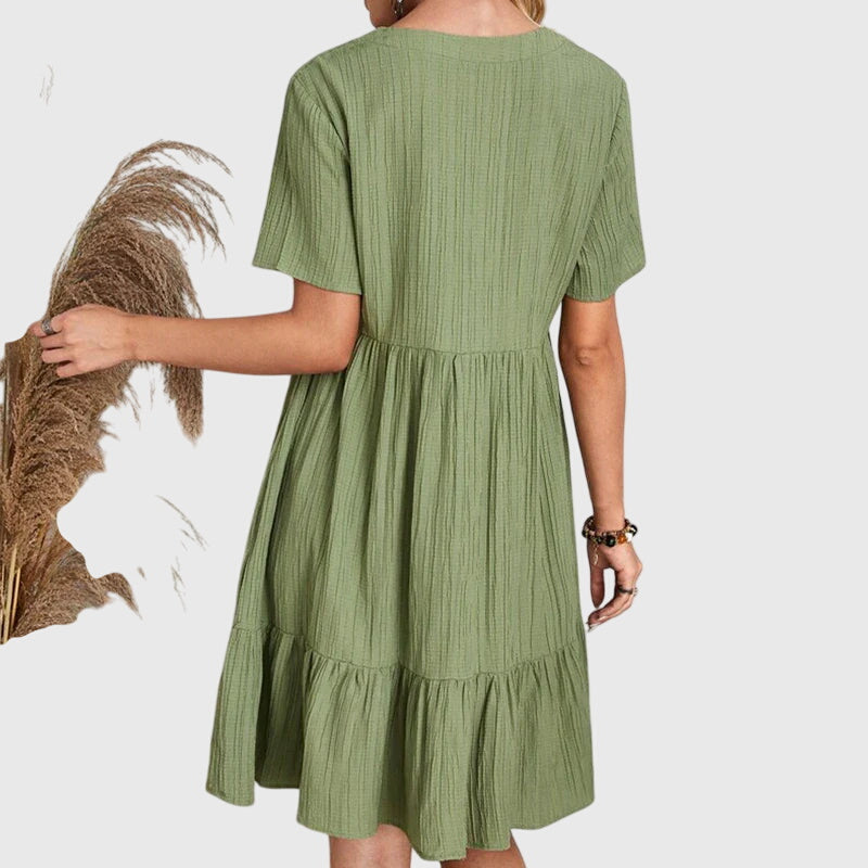 Alakot kiemelő elegáns ruha – 6. kép